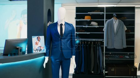 Photo for Empty fashion boutique for shopaholic modern people, commercial activity with merchandise in clothing store. Trendy collections of formal or casual wear in retail market shopping center. - Royalty Free Image