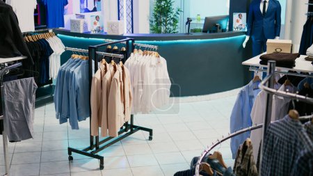 Photo for Shopping center showroom with clothes from trendy collections, retail market boutique with modern and fashionable wear. Empty clothing store filled with new trends and fashion brands. - Royalty Free Image