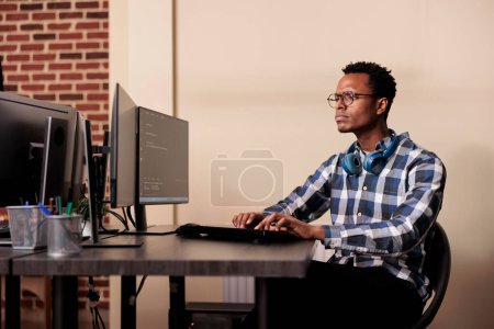 Photo for Tech enginner working on new user interface with online system to create algorithm in it agency office. Software developer programming html code algorithm on computer, typing sever data - Royalty Free Image
