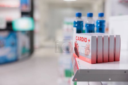 Photo for Empty pharmacy retail store with cardiology pills and treatment on shelves, used by customers to buy healthcare drugs and pharmaceutical products. Health care store with supplements and medication - Royalty Free Image