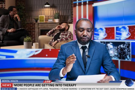 Photo for Newscaster does psychotherapy story on news program, talking about therapy providing safe space for people to unpack their emotions and help with depression. Mental health support details. - Royalty Free Image