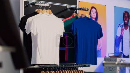 Photo for Department store massive showroom with merchandise from various clothing brands, retail boutique with stylish and casual clothes. Empty shopping center shop filled with fashionable trends. - Royalty Free Image