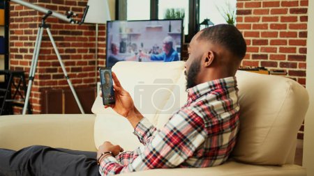 Photo for African american employee having one on one chat with coworker over online video call session, brainstorming ideas. Teleworker in video conference meeting with collegue while working from home - Royalty Free Image