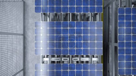 Foto de Vista superior de la línea de montaje del panel solar operada por brazos robot de alta tecnología en fábrica sostenible moderna. Toma aérea del proceso de producción fotovoltaica que tiene lugar en instalaciones automatizadas - Imagen libre de derechos