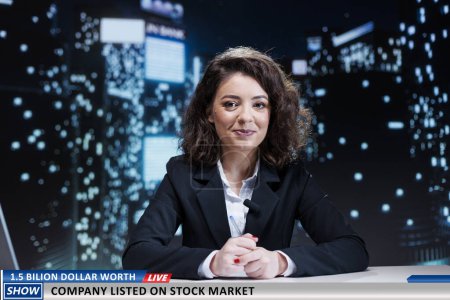 Photo for News program about billions dollars company sold on stock market, business value worth a lot of money. Woman journalist on late talk show discussing economics sector, live broadcast. - Royalty Free Image