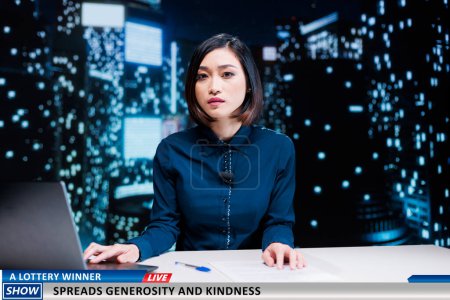 Photo for News about lottery winner generosity and kindness, lucky person donating part of prize addressed by asian media reporter. Woman newscaster hosting live night show on tv channel. - Royalty Free Image