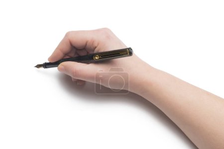 Foto de La mano de la mujer escribe usando una pluma estilográfica - Imagen libre de derechos