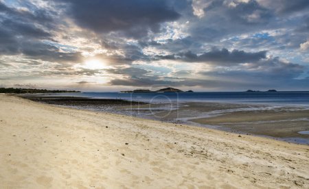 Photo for View from the beach to the island in Torres Strait on a storm night - Royalty Free Image