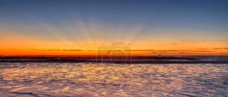 Photo for Orange sunset over the ocean in Surfers Paradise, Queensland. - Royalty Free Image