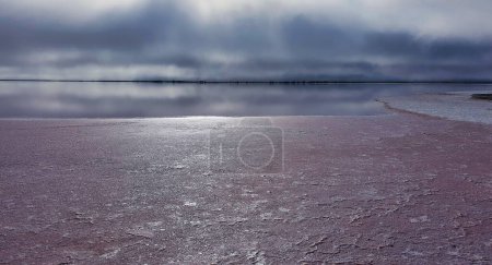 Victoria Australia largest inland salt lake. View of the lake and salt deposits on misty morning. Lake Tyrrell is a shallow, salt-crusted depression in the Mallee district of north-west Victoria, in Australia.