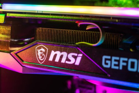 Photo for Dnipro, Ukraine - February 23, 2023: MSI Geforce RTX gaming graphics card in a open case with glow. - Royalty Free Image