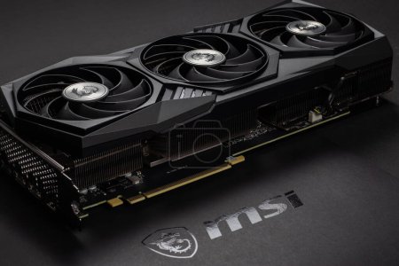 Photo for Dnipro, Ukraine - February 23, 2023: MSI graphics video card details with logo, PC hardware close-up with selective focus. - Royalty Free Image