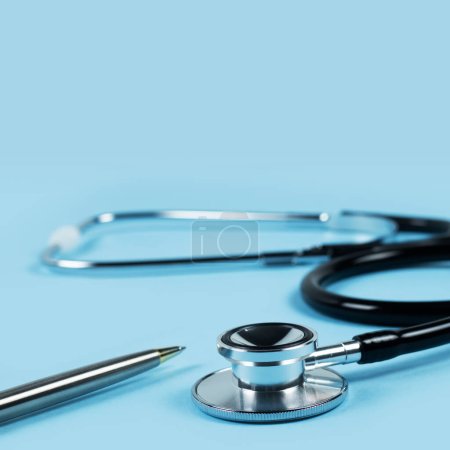 Photo for Black stethoscope for doctor diagnostic coronavirus disease, medical tool for health on blue background with copy space. - Royalty Free Image