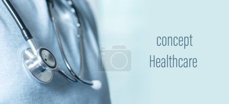 Photo for Medical doctor or physician in white blue uniform with stethoscope in hospital or clinic. - Royalty Free Image