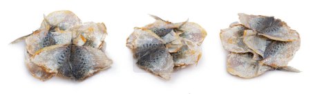 Photo for Dry salted yellowstripe scad. Dried small fish isolated, selaroides snack, stockfish beer snacks, dried flat fillet on white background. Collection - Royalty Free Image