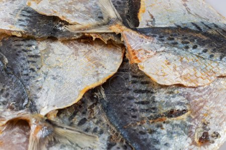 Photo for Dried yellowstripe scad fishes. snack for beer. - Royalty Free Image