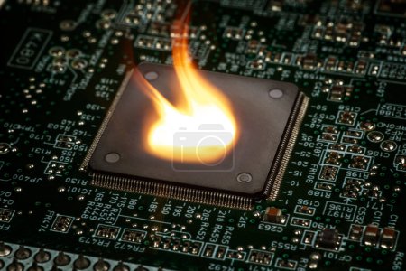 Fire burning micro chip on circuit board with electronic.
