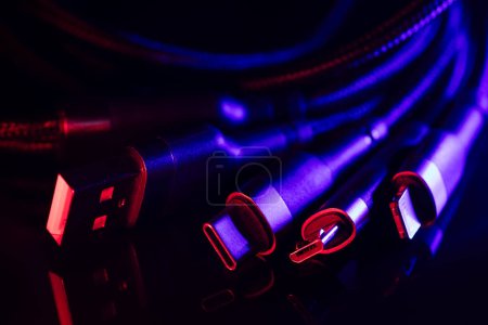 Photo for Different USB charging plugs isolated on dark background. USB Type C, Micro USB. - Royalty Free Image
