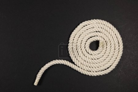 Photo for Rope detail on dark. Close-up of its rope texture Depth of field minimalism ropes. - Royalty Free Image