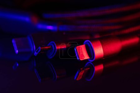 Photo for Different USB charging plugs on dark background. USB Type C, Micro USB, Usb lightning. - Royalty Free Image