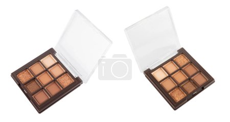 Make-up palette floating over a white background. Professional multicolor eye shadow make-up palette. Cosmetic products.