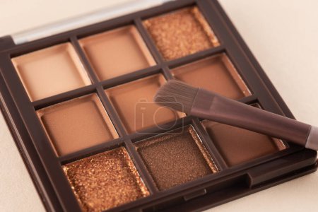 Make-up palette yey shadows cosmetics with brush. beauty product.