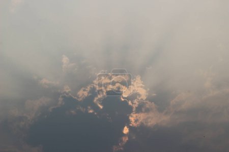 Photo for The sunlight that was blocked by the clouds formed a ray of light. - Royalty Free Image
