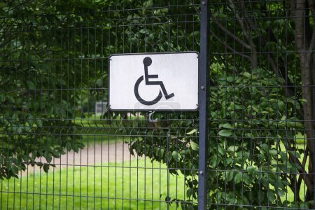 Photo for Inclined road sign, a sign for the start of parking and places for people with disabilities, disabled parking for people, mobility issues, accessibility parking with spaces sign, wheelchair sign - Royalty Free Image