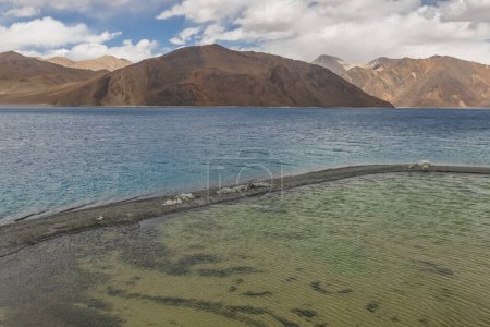 Photo for Pangong Lake is the highest saltwater lake in the world,Pangong Tso or Pangong Lake is an endorheic lake spanning eastern Ladakh and West Tibet situated at an elevation of 4,225 m , Ladakh, India, - Royalty Free Image