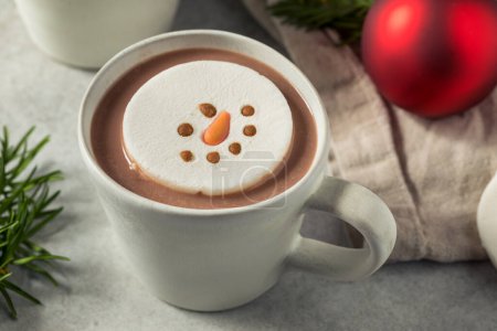Photo for Warm Hot Chocolate with a Snowman Marshmallow Ready to Drink - Royalty Free Image