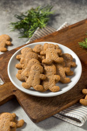 Photo for Homemade Gingerbread Men Cookies with Sugar on a Plate - Royalty Free Image