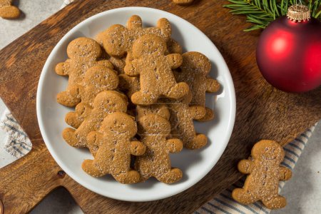 Photo for Homemade Gingerbread Men Cookies with Sugar on a Plate - Royalty Free Image