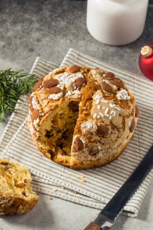 Photo for Homemade Italian Panettone Bread with Sugar and Dried Fruit - Royalty Free Image