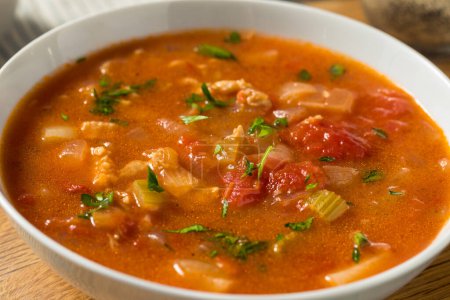 Photo for Homemade Manhattan Clam Chowder with Tomato and Parsley - Royalty Free Image