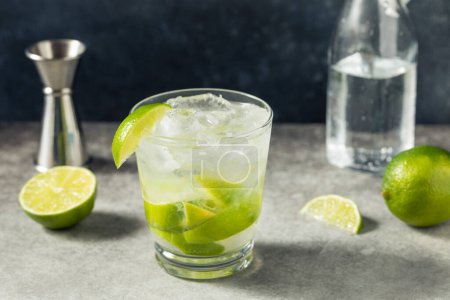 Photo for Boozy Refreshing Guaro Sour Cocktail with LIme and Soda - Royalty Free Image