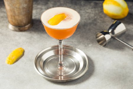 Photo for Boozy Cold Earl Grey Martini Cocktail with Gin and Lemon - Royalty Free Image