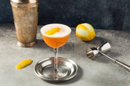 Photo for Boozy Cold Earl Grey Martini Cocktail with Gin and Lemon - Royalty Free Image