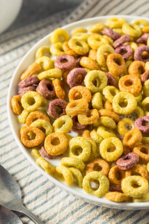 Photo for Homemade Fruity Fruit Loop Cereal with Whole Milk - Royalty Free Image
