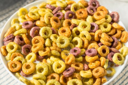 Photo for Homemade Fruity Fruit Loop Cereal with Whole Milk - Royalty Free Image