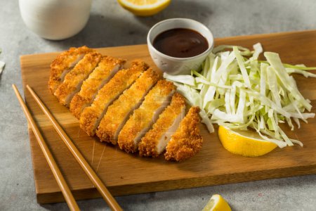 Photo for Homemade Japanese Chicken Tonkatsu with Cabbage and Lemon - Royalty Free Image