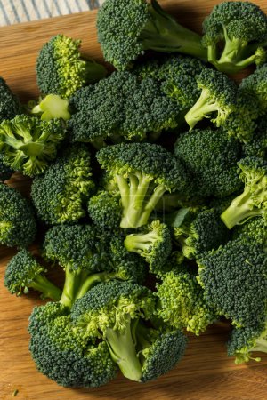 Photo for Raw Green Organic Broccoli Florets Ready to Cook - Royalty Free Image