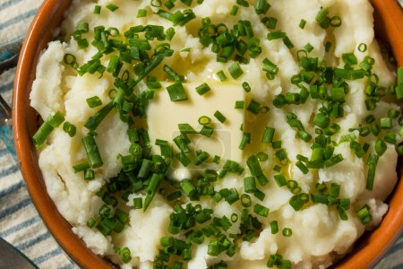 Photo for Homemade Chive Mashed Potatoes in a Bowl for Dinner - Royalty Free Image