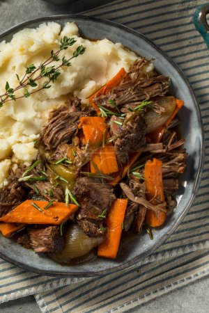 Photo for Homemade Beef Pot Roast with Carrots and Mashed Potatoes - Royalty Free Image