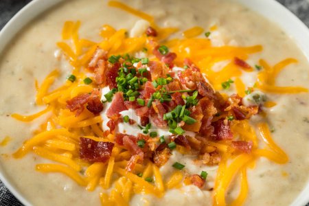 Photo for Savory Homemade Baked Potato Soup with Bacon and Cheese - Royalty Free Image