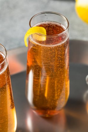 Photo for Boozy Refreshing French Kir Royale Champagne Cocktail with Lemon and Cassis - Royalty Free Image