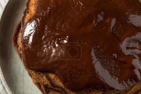 Photo for Gourmet Homemade Chocolate Pancakes With Ganache Sauce - Royalty Free Image