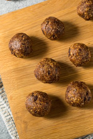 Photo for Homemade Chocolate Oatmeal Energy Balls for Breakfast - Royalty Free Image