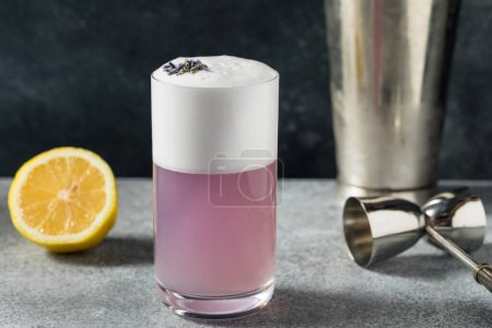 Boozy Purple Lavender Gin Fizz Cocktail with Lemon and Soda Water