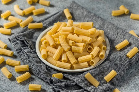 Photo for Dry Organic Durum Maccheroni Pasta in a Bowl - Royalty Free Image