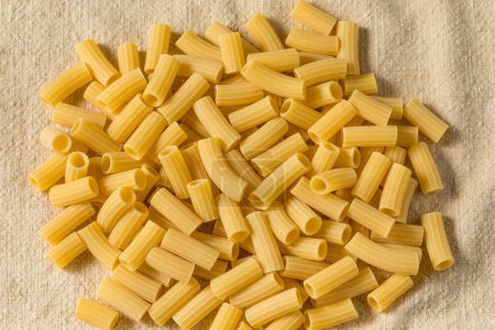 Photo for Dry Organic Durum Maccheroni Pasta in a Bowl - Royalty Free Image